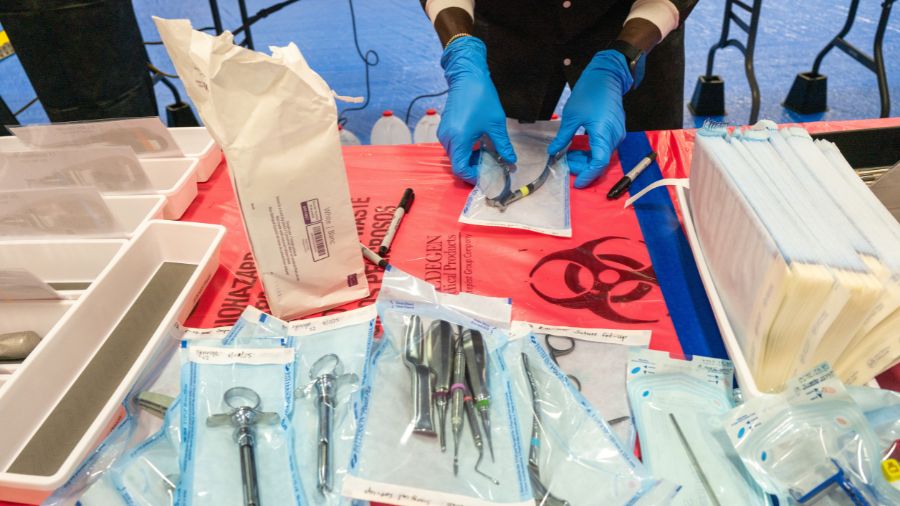 TERRE HAUTE, INDIANA - AUGUST 02: Medical students volunteer at a Remote Area Medical (RAM) mobile ...